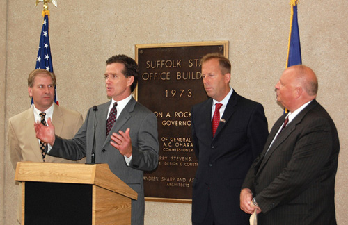 Senator Flanagan discusses the energy-saving upgrades to the Perry B. Duryea building at a recent press conference with (from left to right) Paul Larrabee of OGS, Kevin Law of LIPA and Richard Kessel of NYPA.