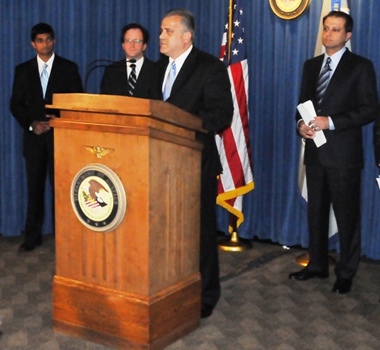 A/ADIC George Venizelos speaking at the press conference with United States Attorney Preet Bharara (far right)  Photo Credit: Rebecca Callahan, FBI